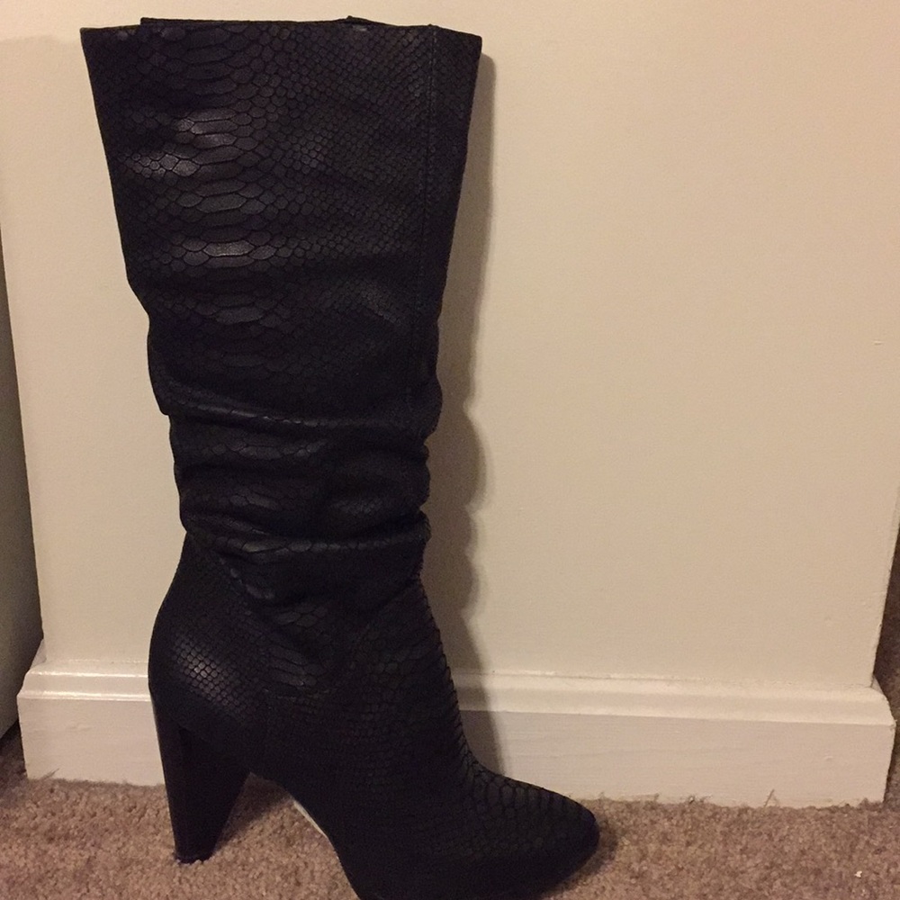 Carlos Santana boots